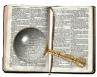 Bible and magnifying glass